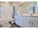 Bathroom with double vanity and shower/tub combo at 9490 W 14Th Ave # 3, Lakewood, CO 80215