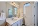 Double vanity bathroom with large mirror at 9490 W 14Th Ave # 3, Lakewood, CO 80215