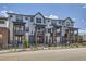 Modern three story townhome exterior at 9490 W 14Th Ave # 3, Lakewood, CO 80215