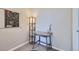 Well-lit home office features a desk, floor lamp, and decorative wall art at 9490 W 14Th Ave # 3, Lakewood, CO 80215