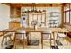 Spacious dining room with a long wooden table, perfect for entertaining and Gathering meals at 6455 Dakota Ridge Dr, Golden, CO 80403