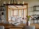 Open-concept dining room with a view of the adjacent living room through a doorway at 6455 Dakota Ridge Dr, Golden, CO 80403