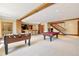 Spacious game room with pool table, foosball, a bar, and a staircase at 6455 Dakota Ridge Dr, Golden, CO 80403