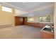 Large garage with a work space, cabinets, utility sink, and lots of shelving for storage at 6455 Dakota Ridge Dr, Golden, CO 80403