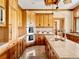 Well-equipped kitchen with custom cabinets, modern appliances, and a large island with countertop seating at 6455 Dakota Ridge Dr, Golden, CO 80403