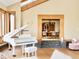 Bright and airy living area showcasing a grand piano, hardwood floors, and views into the dining room at 6455 Dakota Ridge Dr, Golden, CO 80403