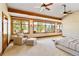 Bright main bedroom boasts floor-to-ceiling windows with stunning views at 6455 Dakota Ridge Dr, Golden, CO 80403