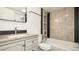 Modern bathroom boasts updated fixtures, stylish vanity and shower-tub combo at 18106 E Ohio Ave # 103, Aurora, CO 80017