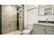 Modern bathroom features updated fixtures, glass enclosed shower, and stylish vanity at 18106 E Ohio Ave # 103, Aurora, CO 80017