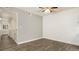Bright and spacious bedroom with wood-look flooring and neutral paint at 18106 E Ohio Ave # 103, Aurora, CO 80017