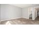Carpeted bedroom with attached bathroom features a soothing, neutral color palette at 18106 E Ohio Ave # 103, Aurora, CO 80017