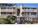 Inviting condo building with charming stone accents and private balconies at 18106 E Ohio Ave # 103, Aurora, CO 80017