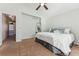 The main bedroom features a ceiling fan, natural light, and closet access at 4774 Coker Ave, Castle Rock, CO 80104