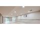 Finished basement with recessed lighting, neutral wall paint, and wood-look floors at 1010 Ash St, Broomfield, CO 80020