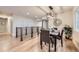 Dining room featuring a modern light fixture and a view into the kitchen at 1010 Ash St, Broomfield, CO 80020
