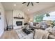 Inviting living room with a cozy fireplace, plush seating, and abundant natural light at 1010 Ash St, Broomfield, CO 80020