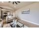 A comfortable seating area and view into the kitchen with stainless steel appliances at 1010 Ash St, Broomfield, CO 80020