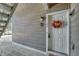 White front door with a fall wreath at 4313 S Andes Way # 103, Aurora, CO 80015