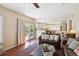 Comfortable living room with access to the backyard through French doors and an open floor plan at 6502 Shea Pl, Highlands Ranch, CO 80130