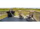 Relaxing back deck with comfortable seating and grill, perfect for outdoor entertaining and scenic views at 42830 Ivydel St, Elizabeth, CO 80107