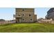 The spacious backyard offers a lush lawn and open space for outdoor activities and relaxation at 42830 Ivydel St, Elizabeth, CO 80107