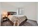 Bedroom featuring carpet, natural light, and stylishly decorated bed at 42830 Ivydel St, Elizabeth, CO 80107