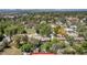 An aerial view of the property shows the yard and surrounding area at 140 S Kendall St, Lakewood, CO 80226