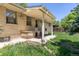 Back of home featuring covered patio at 140 S Kendall St, Lakewood, CO 80226