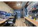 Finished basement featuring wood flooring, desk and computer equipment at 140 S Kendall St, Lakewood, CO 80226