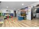 Finished basement featuring wood-look flooring at 140 S Kendall St, Lakewood, CO 80226