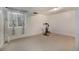 Finished basement provides versatile space for recreation or a home gym with bike at 6532 S Field Way, Littleton, CO 80123