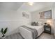 Serene bedroom with a cozy bed, minimalist decor, and plenty of natural light at 6532 S Field Way, Littleton, CO 80123