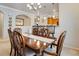 Elegant dining room with neutral decor, stylish furnishings, and a seamless flow to the kitchen at 15501 E 112Th Ave # 33D, Commerce City, CO 80022