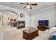 Open living space showcasing fireplace and breakfast bar with eat in kitchen at 15501 E 112Th Ave # 33D, Commerce City, CO 80022