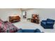 Spacious living room with neutral carpeting, piano, and comfortable seating at 15501 E 112Th Ave # 33D, Commerce City, CO 80022