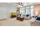 Comfortable living room with sofas, large windows, and classic decor at 15501 E 112Th Ave # 33D, Commerce City, CO 80022