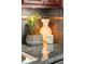 Granite countertop featuring decorative plant, a pineapple lamp, and a candle at 15460 Canyon Gulch Ln # 105, Englewood, CO 80112