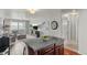 Open concept living room that is connected to the kitchen with a large kitchen island at 15460 Canyon Gulch Ln # 105, Englewood, CO 80112