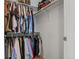 Spacious walk-in closet featuring double racks for ample clothing storage and an organized space at 15460 Canyon Gulch Ln # 105, Englewood, CO 80112