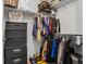Walk-in closet featuring multiple racks, storage bins, and organized hanging space, for all your clothes at 15460 Canyon Gulch Ln # 105, Englewood, CO 80112