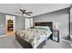 Comfortable bedroom with carpet, side tables, closet, and natural light at 2862 W Long Dr # A, Littleton, CO 80120