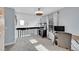 Spacious loft featuring desk, fish tank, and large window at 2862 W Long Dr # A, Littleton, CO 80120