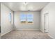 Bedroom with neutral paint and carpet with multiple windows for natural lighting at 2662 E 103Rd Ave, Thornton, CO 80229