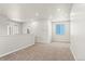 Bright living room featuring recessed lighting and neutral walls with a view at 2662 E 103Rd Ave, Thornton, CO 80229