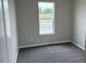 Cozy carpeted bedroom offers a calm and relaxing space at 1759 Jennifer St, Brighton, CO 80601