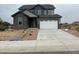 Beautiful two-story home with a two car garage and neutral gray paint at 1759 Jennifer St, Brighton, CO 80601