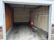 Garage featuring interior view of the parking space with concrete floor and an open ceiling at 5255 Memphis St # 1009, Denver, CO 80239