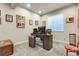 Bright office featuring neutral walls, carpet, and a window offering natural light at 25059 E Alder Dr, Aurora, CO 80016