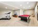 Basement showcasing a vibrant pool table, TV area, and treadmill for entertainment and fitness at 4920 S Netherland Way, Centennial, CO 80015