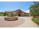 Community clubhouse featuring a decorative fountain, stone accents, and inviting entrance at 4920 S Netherland Way, Centennial, CO 80015
